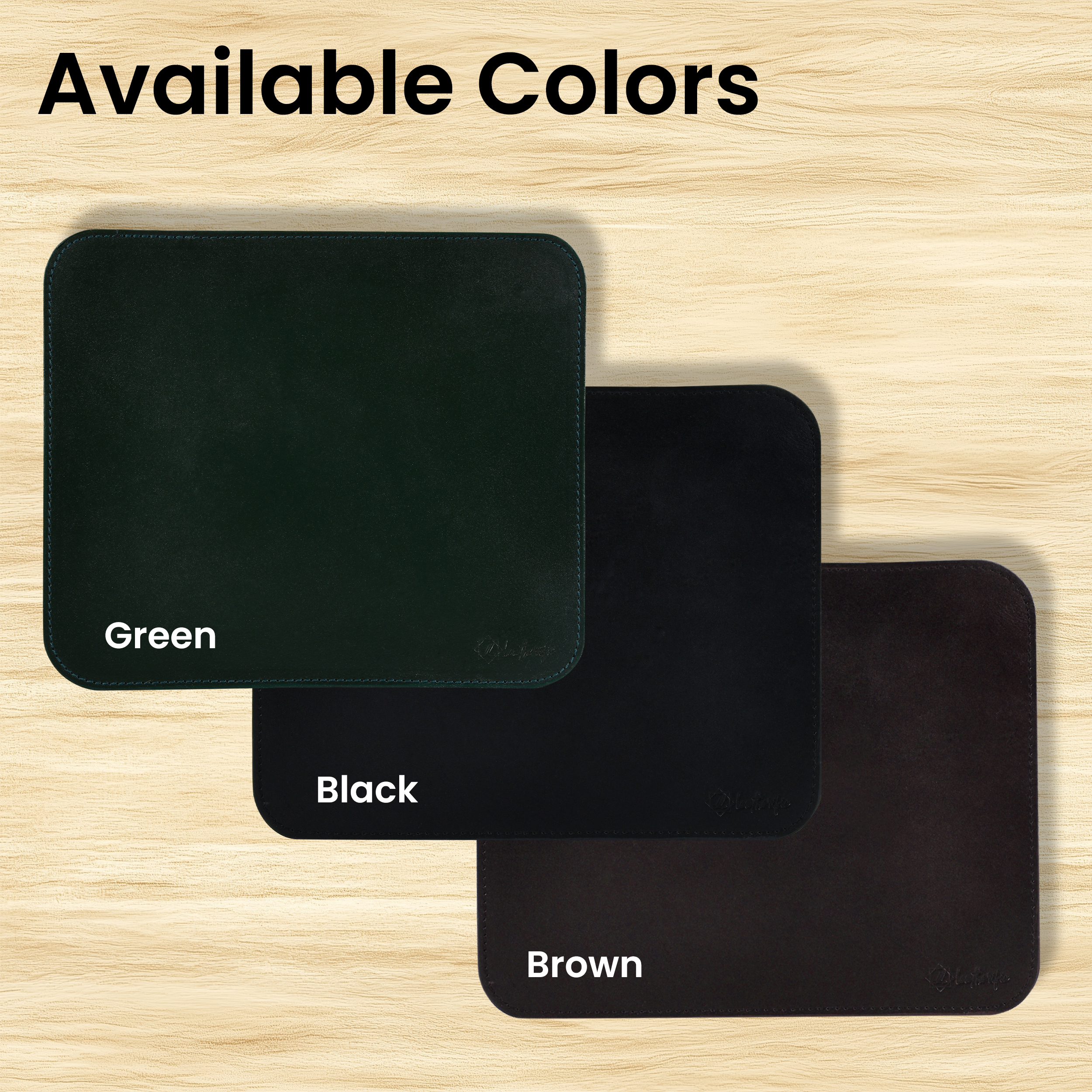 Leatherific handcrafted leather mousepads in green, black, and brown displayed on a wooden background with “Available Colors” text.